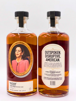 A close up product image of Madam Whiskey on a white background with front and back labels visible.